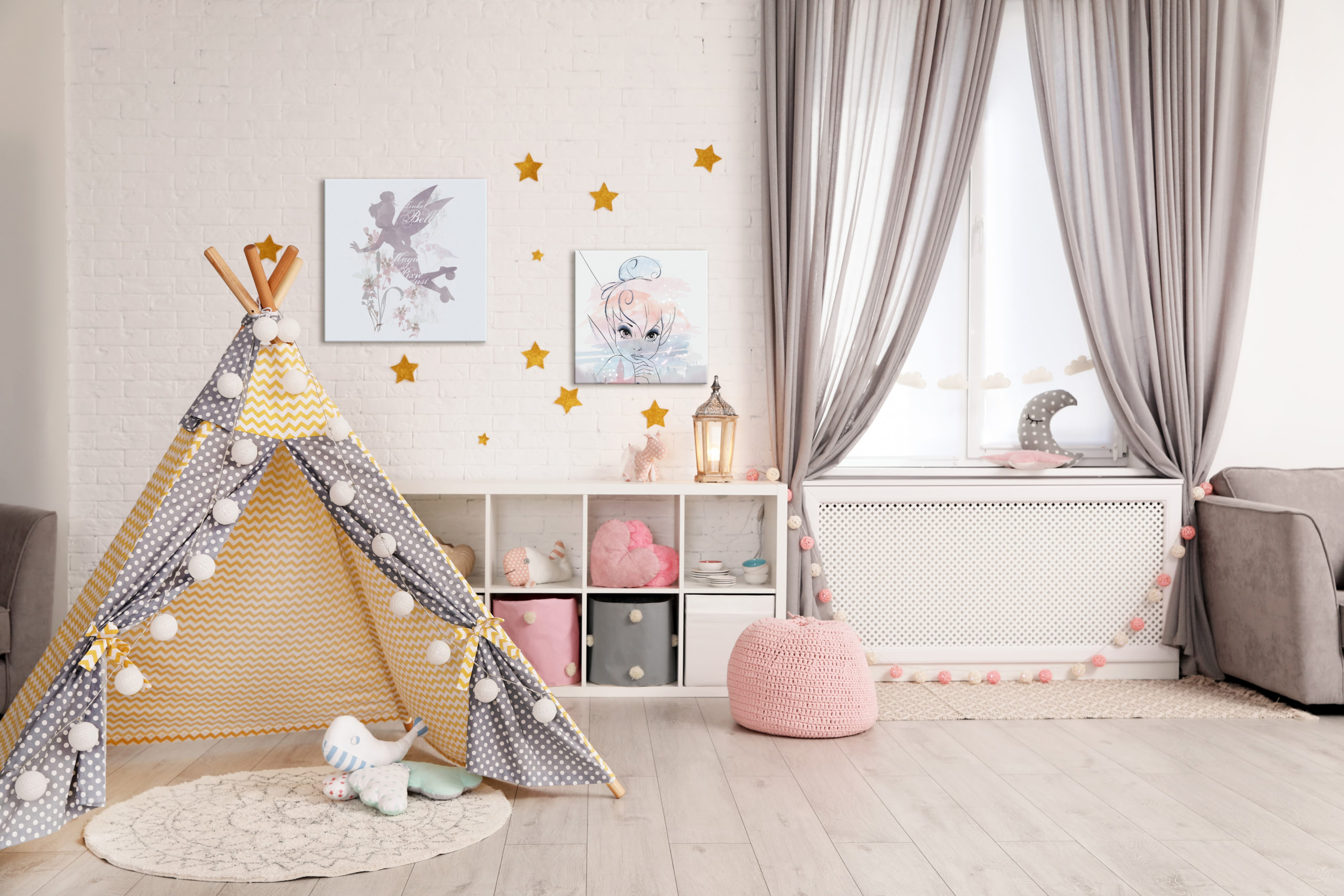Cozy kids room interior with play tent and toys